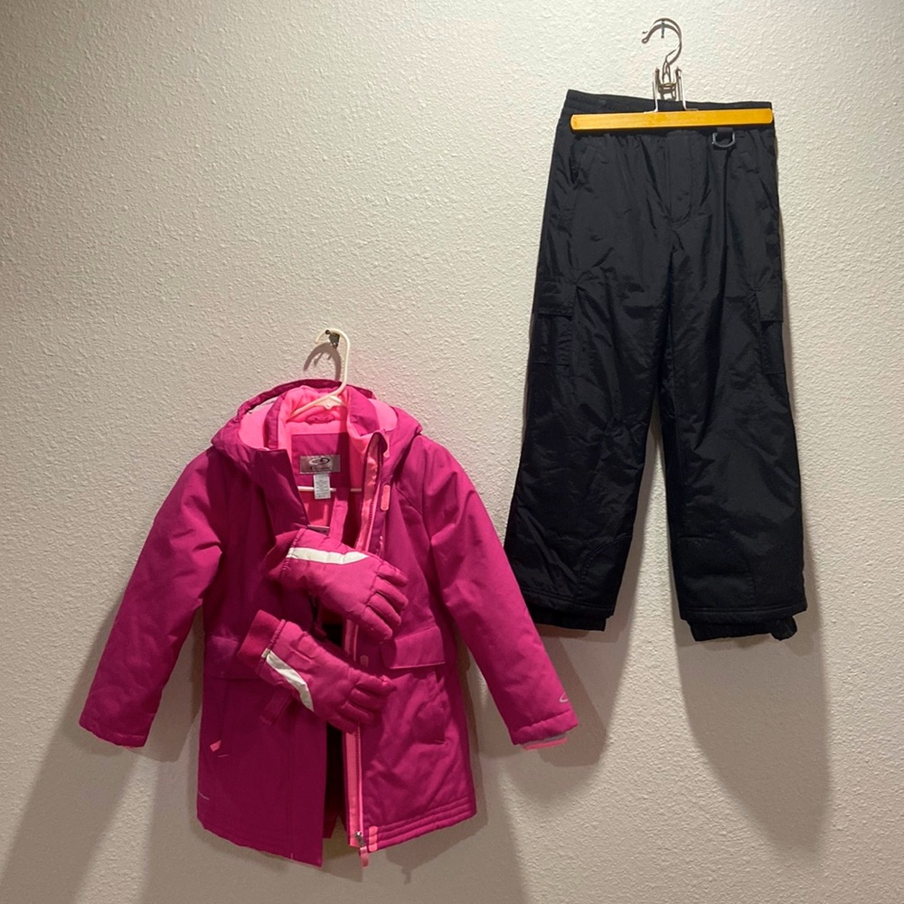 Champion snow jacket, with gloves and snow pants.